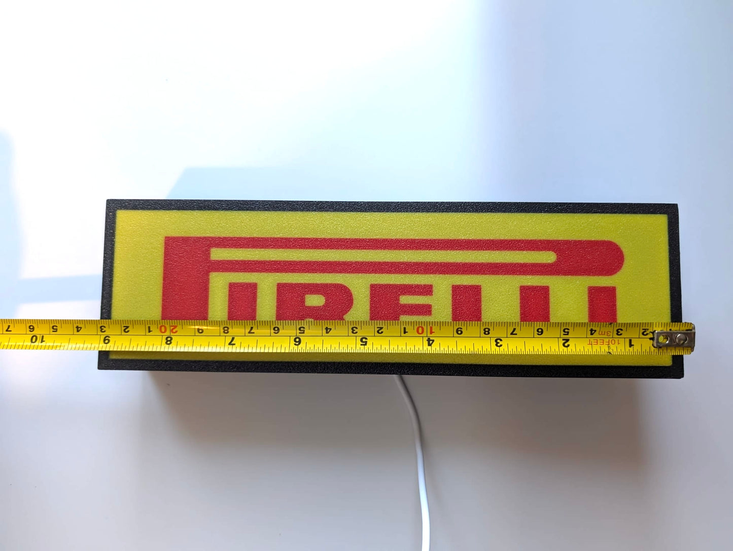 Pirelli Lightbox Illuminated Logo Sign